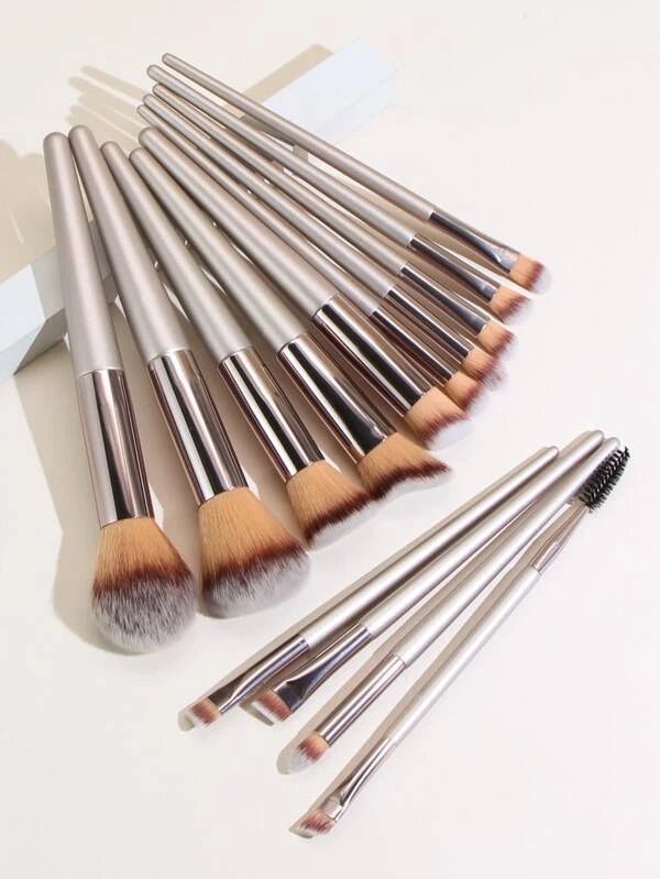 14 قطعة من فرش المكياج بلون ذهبي شامبين م