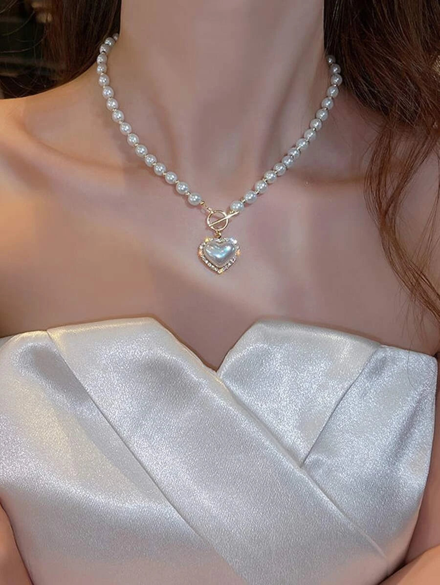 Rhinestone and faux pearl heart pendant necklace with OT buckle