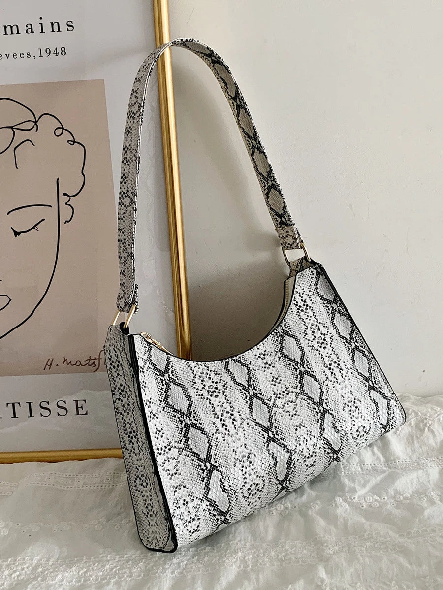 Snakeskin print baguette bag